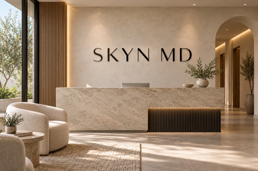 AI-generated reception concept for SKYN MD — Costa Mesa; not a photograph of actual premises.